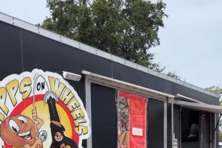 The Sipps On Wheels food truck with its red menu board and service window
